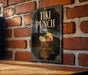 A sign for "Tiki Punch" is displayed on a brick wall, featuring a tiki mask and a tiki-style drink.