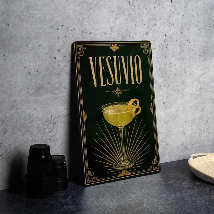 a decorative sign with the word "VESUIVIO" on it, along with an illustration of a cocktail glass.