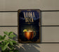 a sign for a vodka-based drink called "Vodka Buck", which is displayed on a wall.
