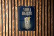 A sign for vodka highball, featuring a glass of highball cocktail with ice and a lemon slice.
