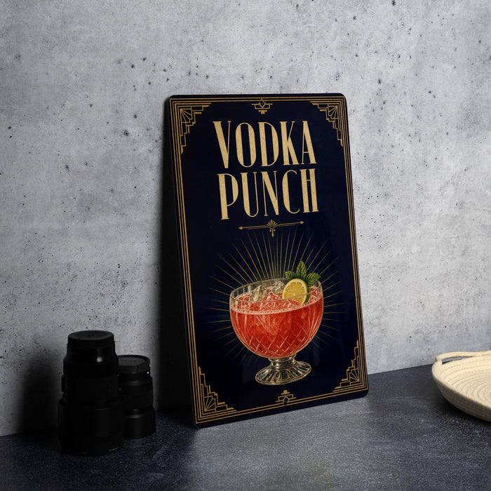 A decorative sign for a vodka punch, featuring an illustration of a cocktail in a glass bowl with garnishes.