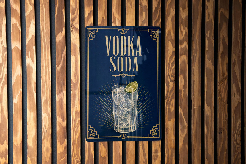 A blue sign with the text "VODKA SODA" and an illustration of a glass of vodka soda.