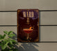 A sign for "Ward 8" featuring an illustration of a cocktail glass with an orange garnish.