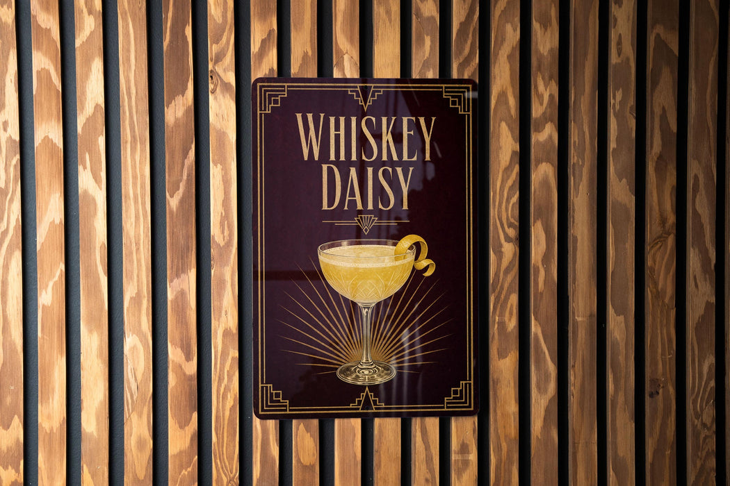 A sign for "Whiskey Daisy" cocktail is displayed on a wooden wall.