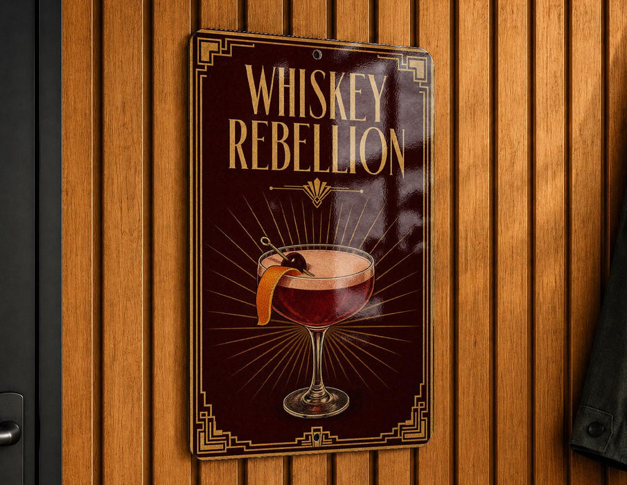 A sign that reads "Whiskey Rebellion" with an illustration of a cocktail on a wooden wall.