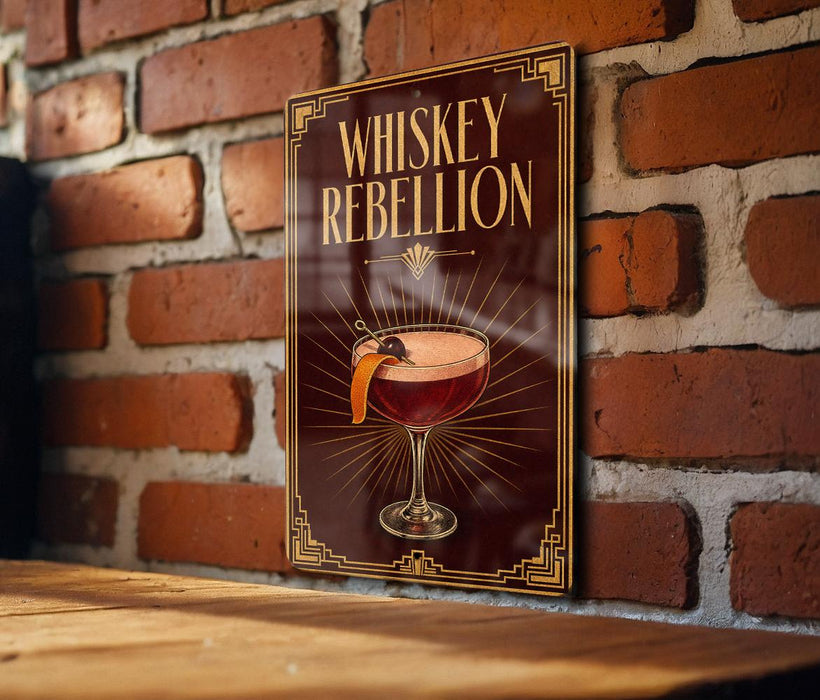 A sign with the text "WHISKEY REBLLION" and an illustration of a cocktail is displayed on a brick wall.