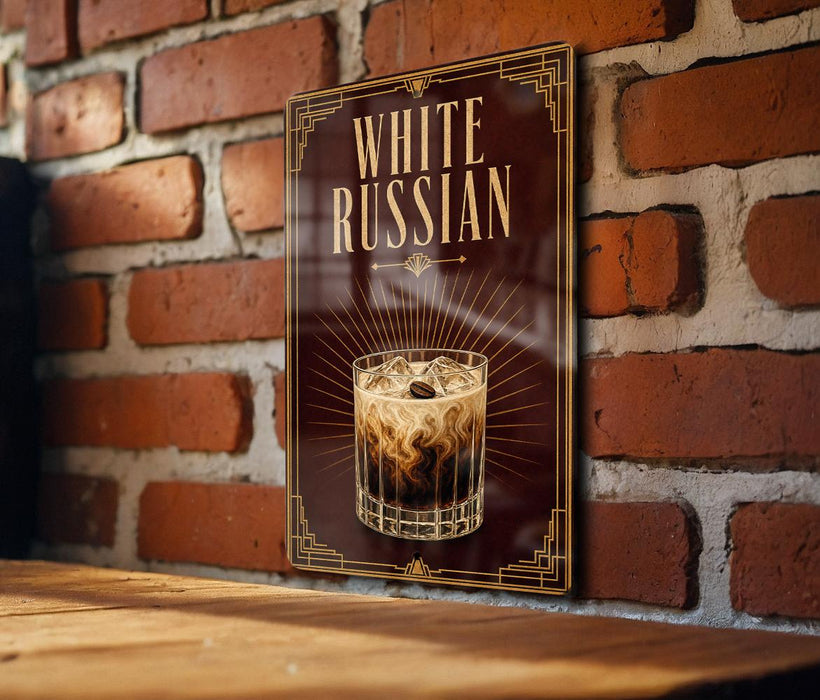 A poster with the text "WHITE RUSSIAN" and an illustration of a cocktail on a brick wall.