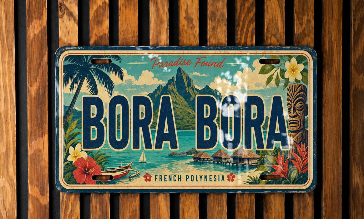 A vintage license plate with the text "BORA BORA" and a tropical landscape featuring palm trees, mountains, and a body of water.