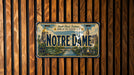 A license plate with the text "Notre Dame" and the Notre Dame Fighting Irish logo, which is the home of the Notre Dame Fighting Irish.