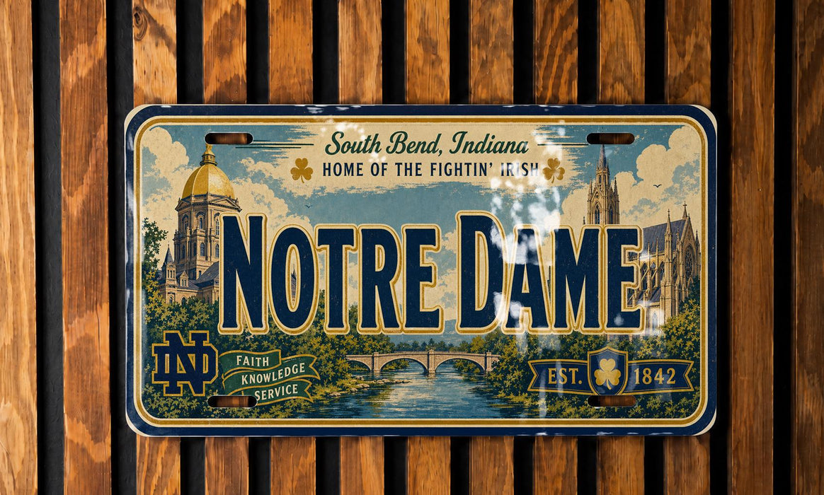 A vintage license plate from Notre Dame, Indiana, with a design depicting the Notre Dame Cathedral and surrounding landscape.