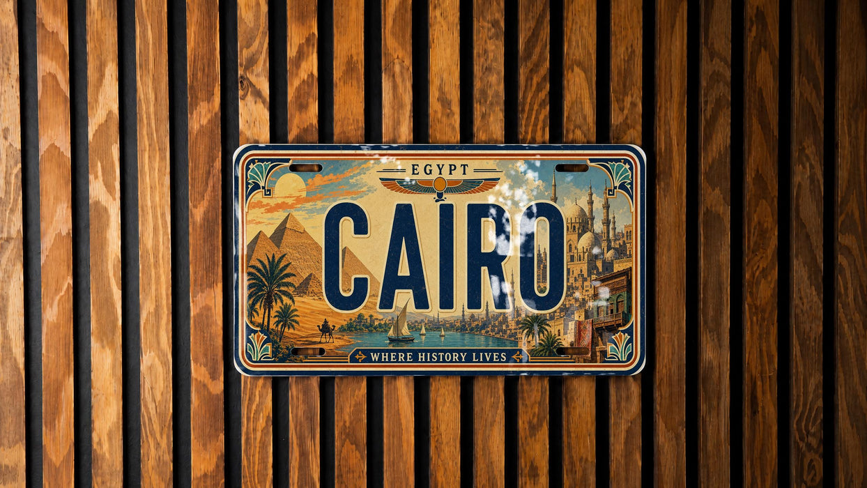 A license plate with the word "CAIRO" printed on it, mounted on a wooden wall.