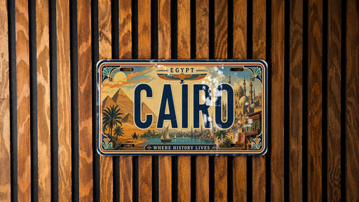 A license plate with the word "CAIRO" printed on it, mounted on a wooden wall.