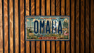 A vintage license plate from Nebraska, with the text "OMAHA NEBRASKA" prominently displayed.