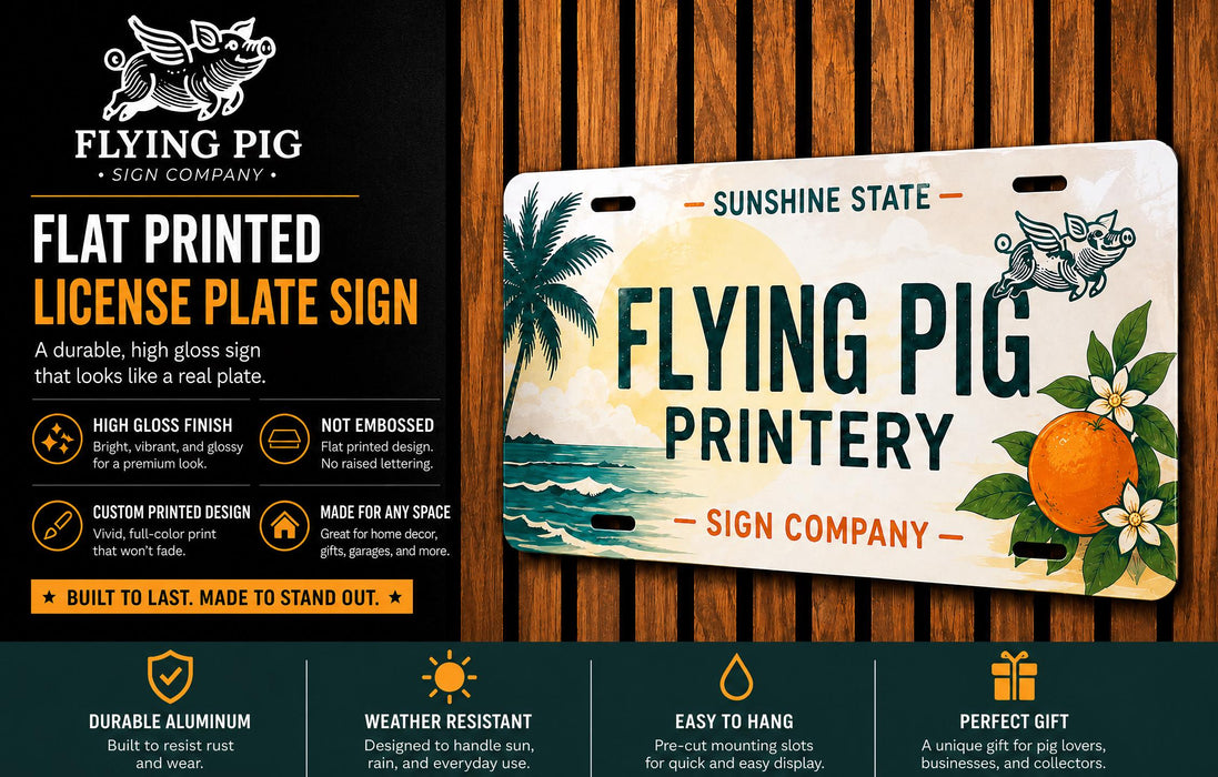 The image is an advertisement for a flat-printed license plate sign from the Flying Pig Sign Company. It features a tropical design with a pig, palm tree, and an orange, and highlights the sign's durability, high gloss finish, custom design options, and ease of hanging.