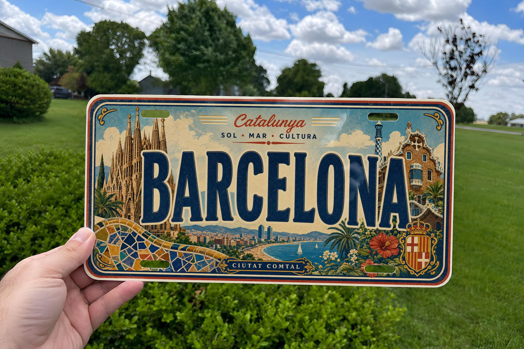 A person is holding a Barcelona license plate in front of a scenic background featuring the city's iconic landmarks and architecture.