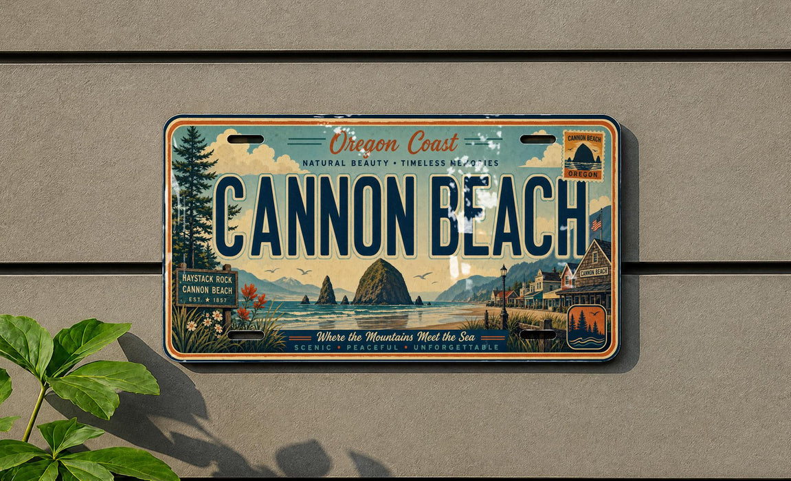 a license plate with a scenic coastal landscape, including mountains, a beach, and a body of water.