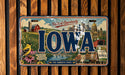 A vintage Iowa license plate with a colorful illustration of the state's landmarks and scenery.