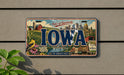 A vintage Iowa license plate with a colorful illustration of the state's landmarks and scenery.