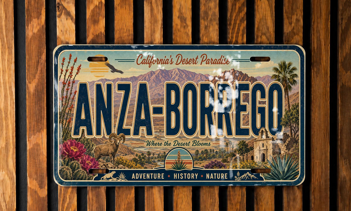 A vintage license plate with the text "ANZA-BORREGO" and various desert-themed illustrations, including mountains, cacti, and a bird.