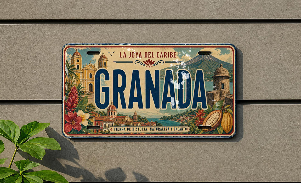 A vintage license plate from Granada, Spain, featuring an illustration of the city's landmarks and natural scenery.