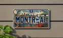 A vintage license plate from Quebec, Canada, featuring an illustration of the city of Montreal.