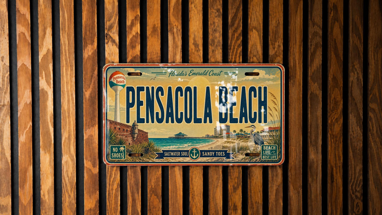 A vintage license plate from Pensacola Beach, Florida, with a beach scene and ocean in the background.