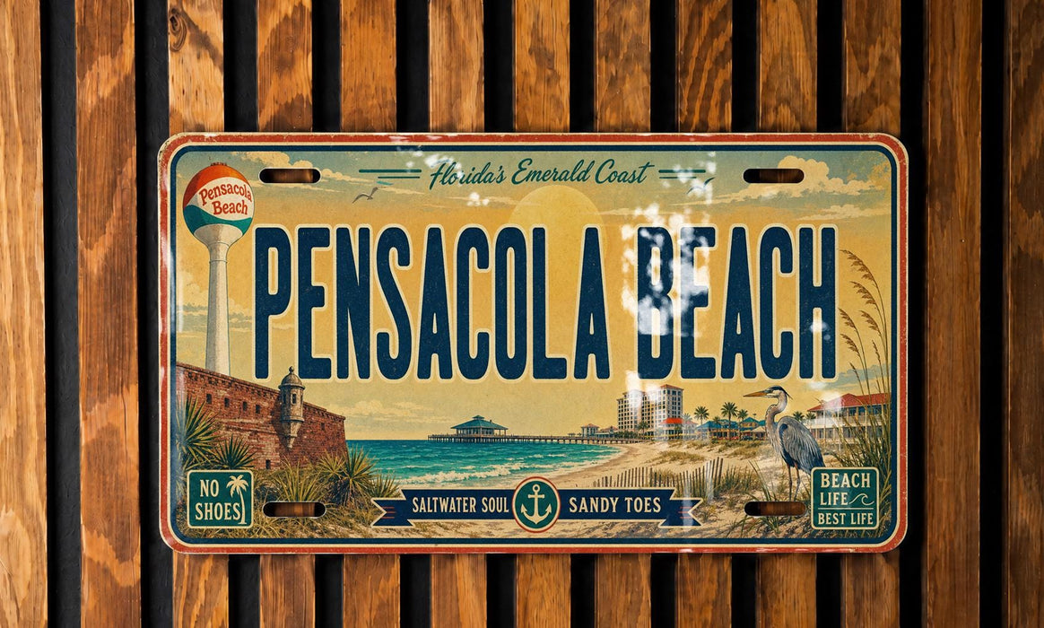 A vintage license plate from Pensacola Beach, Florida, featuring a beach scene with a lighthouse, palm trees, and a bird.