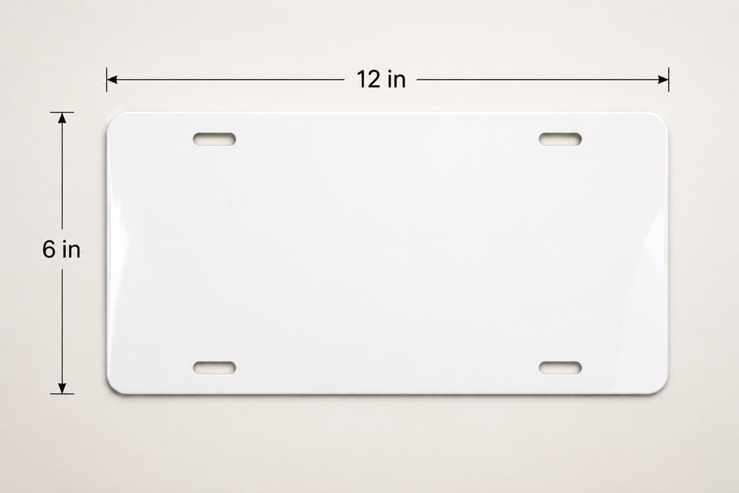 A white license plate with measurements and a scale.