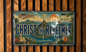 A vintage-style license plate from Brazil featuring the Christ the Redeemer statue and a tropical landscape.