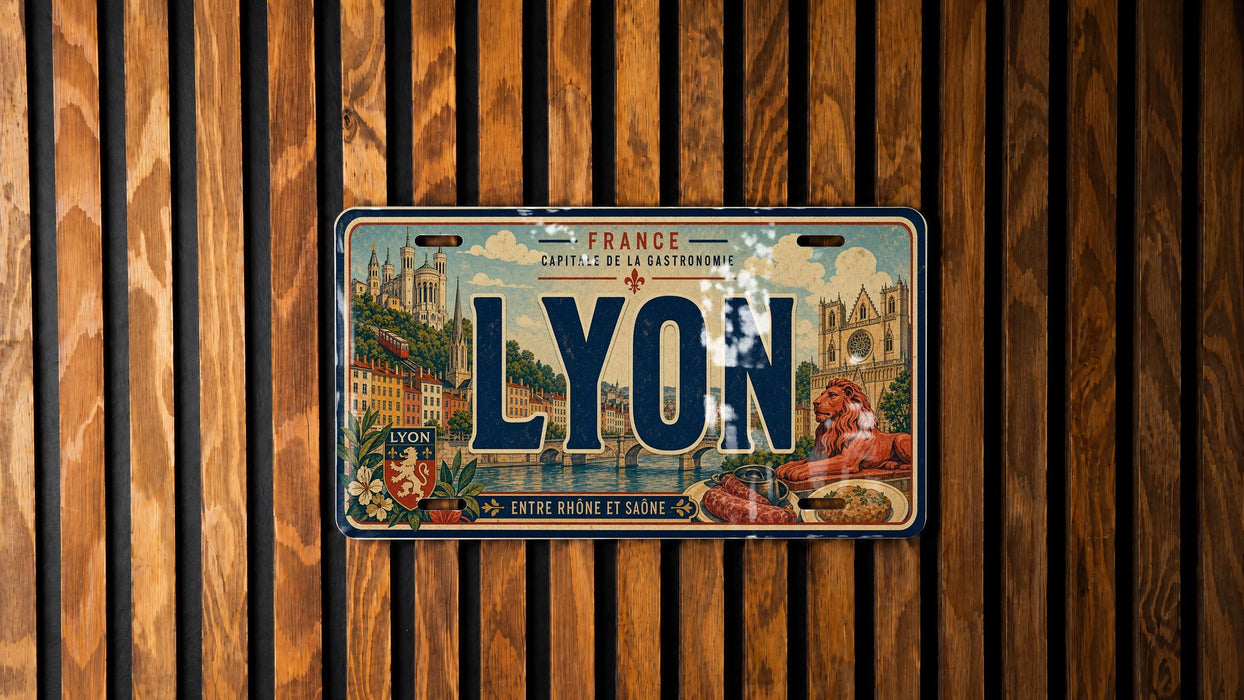 A license plate with the word "LYON" prominently displayed, featuring an illustration of a cityscape and a lion.