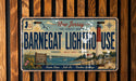 A vintage license plate from New Jersey that reads "Barnegat Lighthouse Use" and features a lighthouse image.