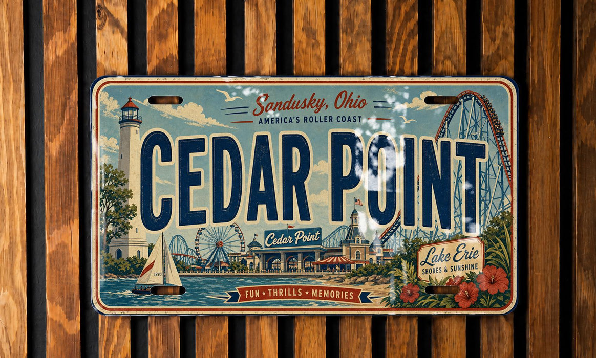 A vintage license plate from Cedar Point, Ohio, featuring an illustration of the amusement park and surrounding landscape.