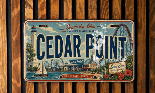 A vintage license plate from Cedar Point, Ohio, featuring an illustration of the amusement park and surrounding landscape.