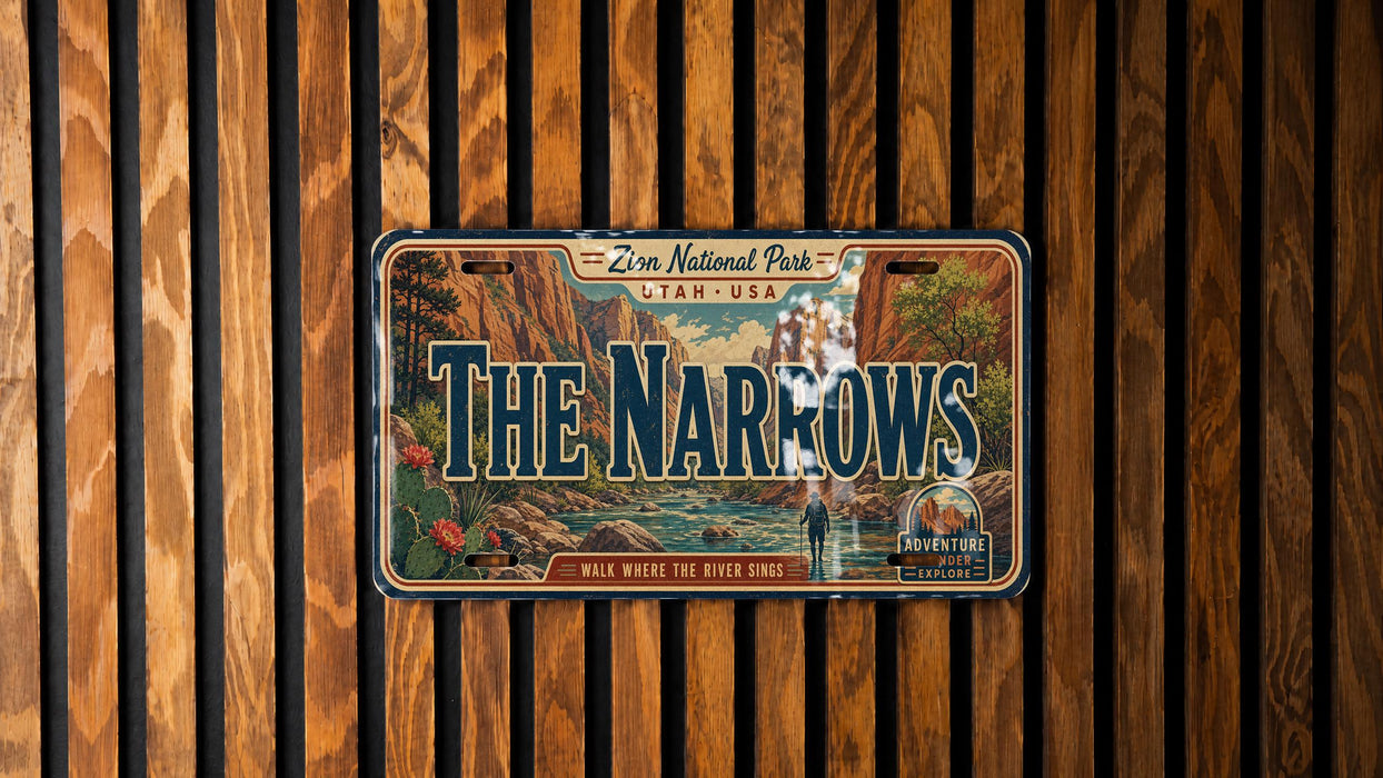 A vintage license plate with the text "The Narrows" and "Zion National Park, Utah, USA" displayed on it, hanging on a wooden wall.