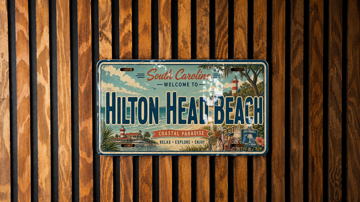 A vintage license plate with a tropical beach theme, mounted on a wooden wall.