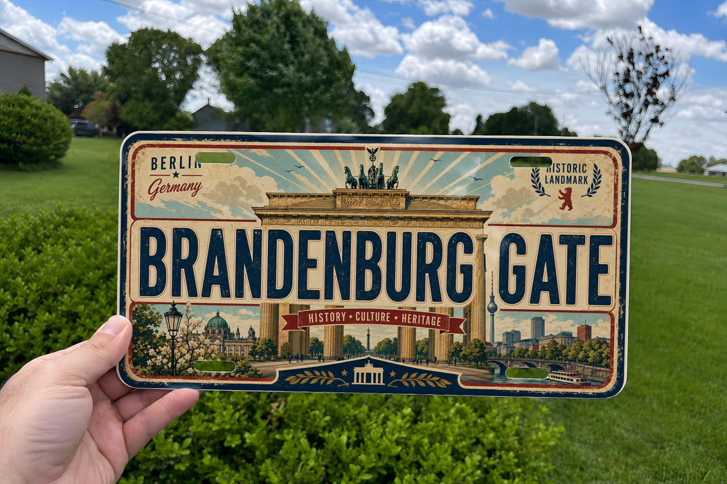 A vintage license plate from Berlin, Germany, with the text "BRANDENBURG GATE" prominently displayed.