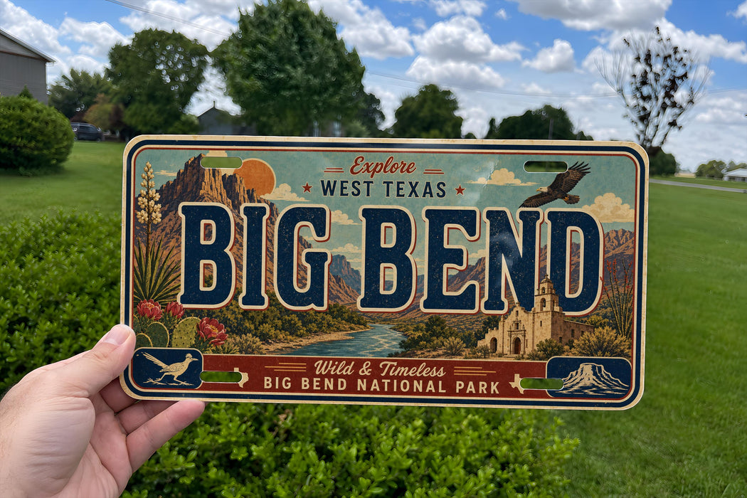 A person is holding a license plate that says "BIG BEND" with a scenic illustration of the area on it.
